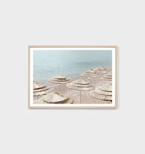 Beachfront Parasols Framed Print