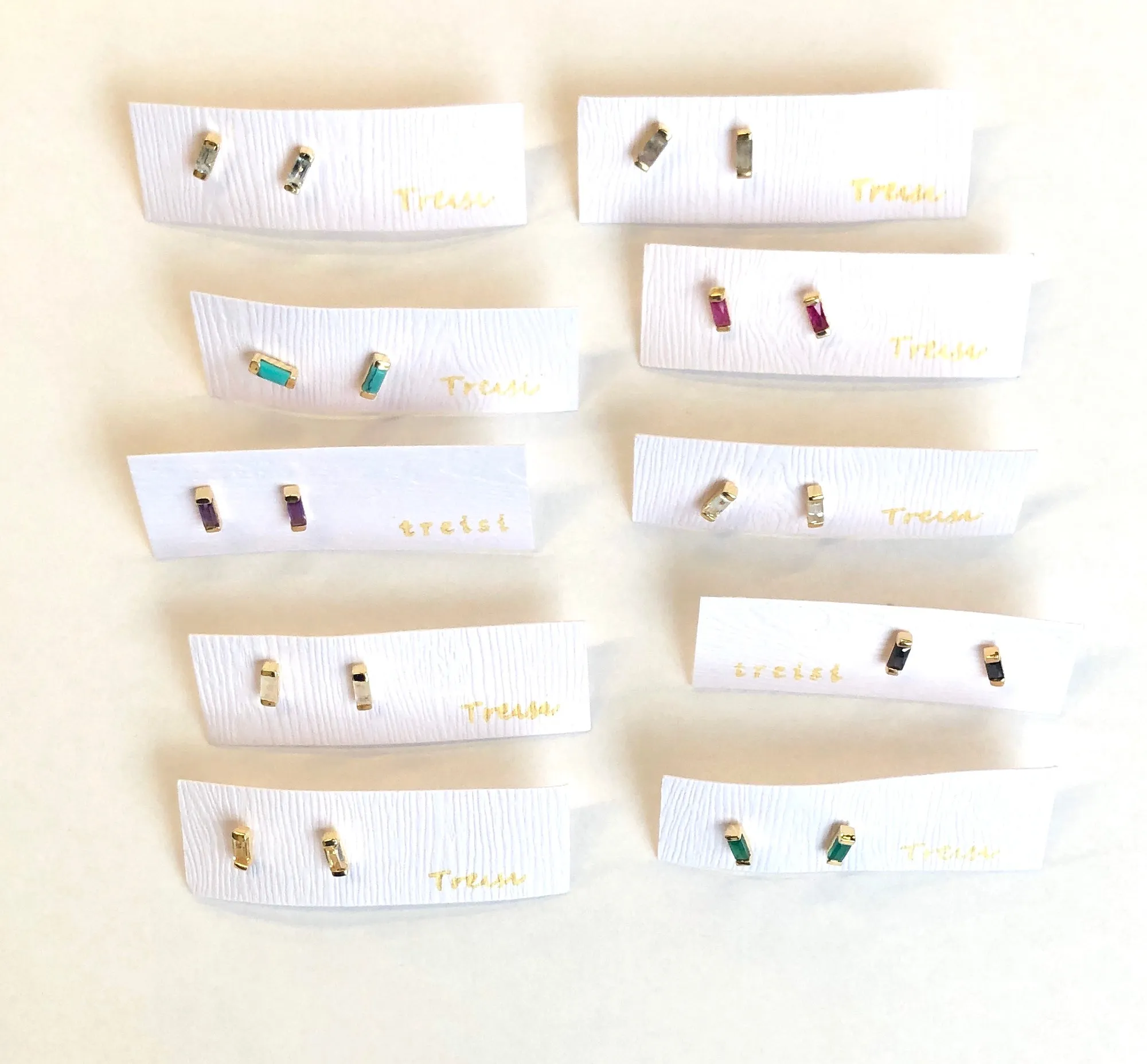 Gold baguette stud earrings