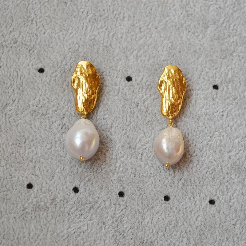 Long drop gold baroque pearl earrings