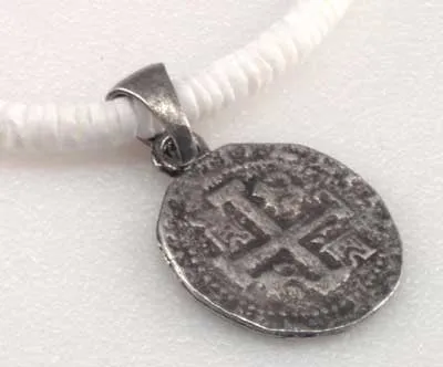 White Pukka Necklace with Celtic Coin